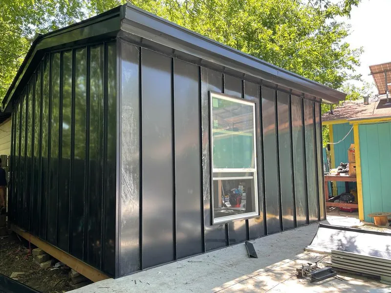 Black standing seam metal wall panels for Roof Inspection in Caldwell