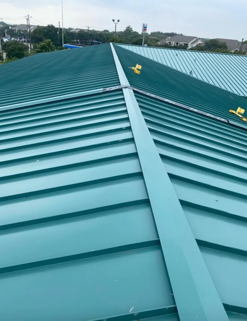 Green commercial metal roof ridge and valley for Metal Roof Repair in Caldwell
